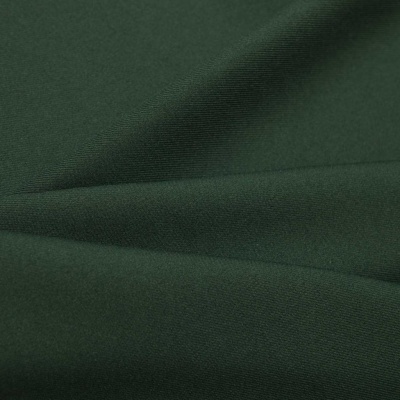 Ткань костюмная 21010 2076, 225 гр/м2, шир.150см, цвет т.зеленый - купить в Екатеринбурге. Цена 390.73 руб.